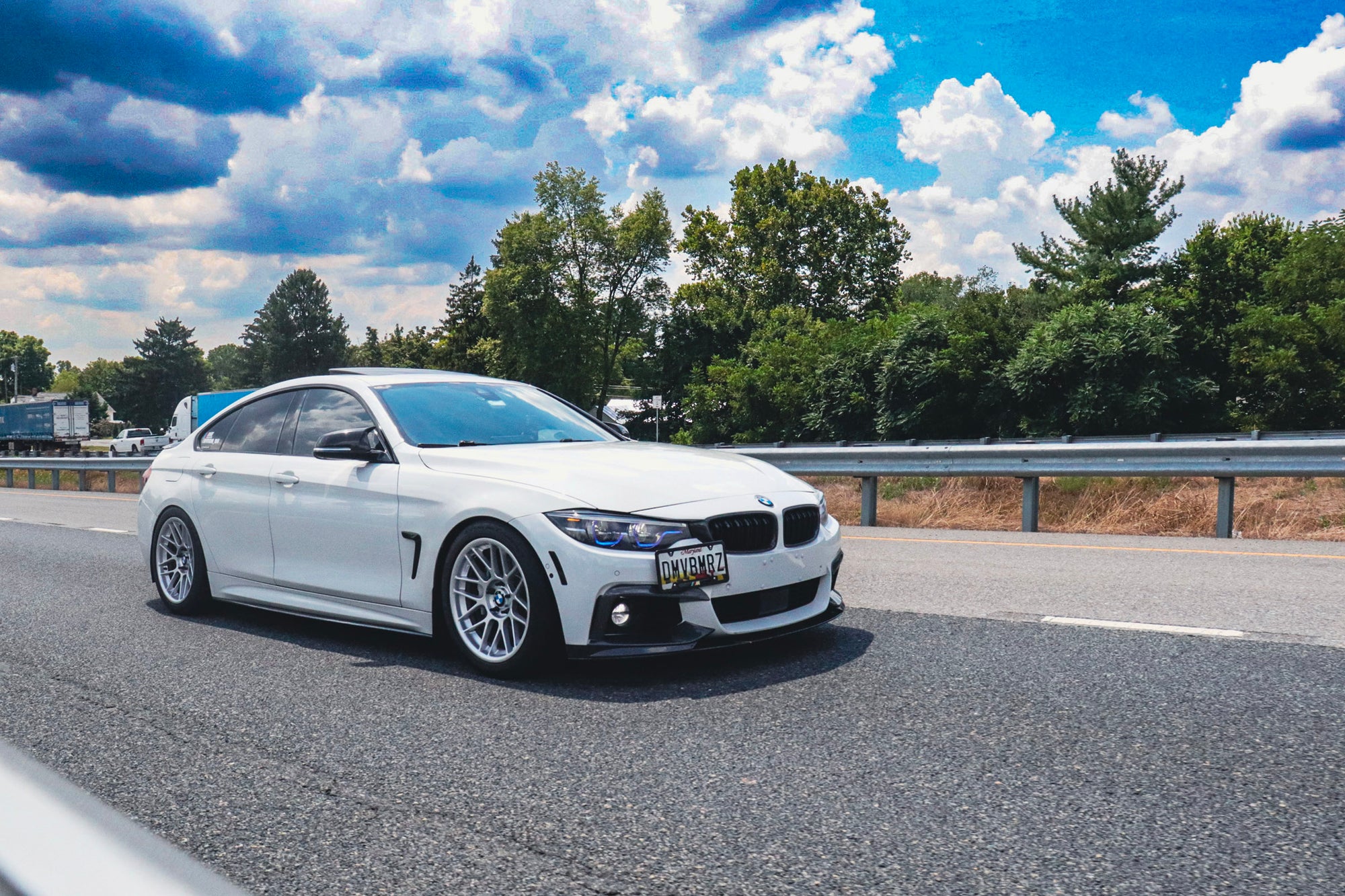 White BMW on DMV road